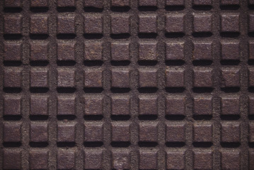 Iron plate with a checkered pattern.