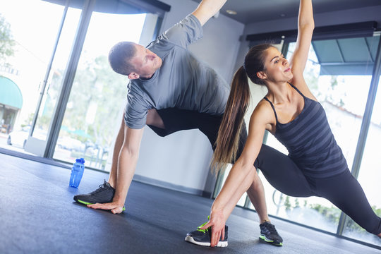 Couple in triangle pose