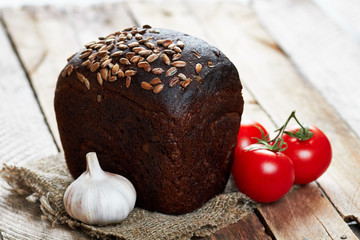 Loaf of bread and vegetables
