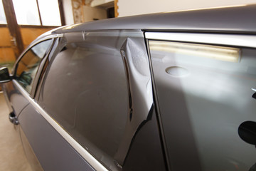 Tinting of glass in car