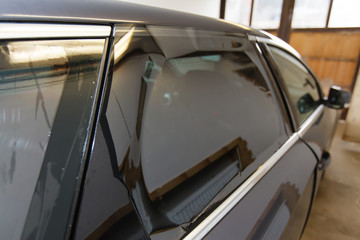 Fototapeta na wymiar Tinting of glass in car