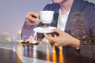 Double exposure of business woman drink a coffee or tea and city, urban and lake at night as relax concept.