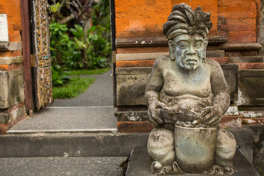 Traditional demon guard statue carved in stone on Indonesia.