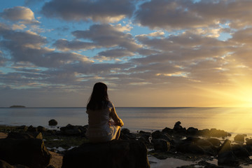 girl watching the sunset