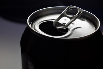 open cans on a black background