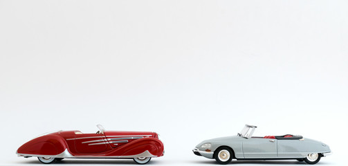 Red and Silver Grey Classic Retro Streamlined Convertible Cars