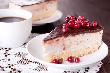 piece of cake on a saucer and chocolate glaze