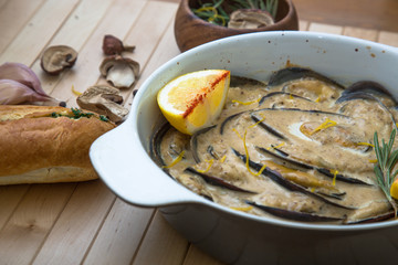 Baked mussels with cheese and lemon