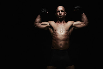 Boxer with arms raised