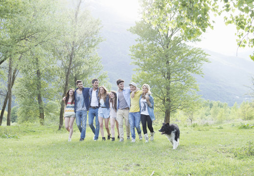 Group of eight young adult friends and their dog, Piemonte, Italy