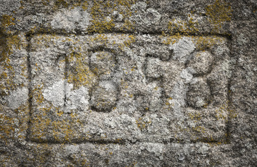 year 1858 carved in the stone