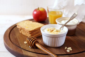 Fresh cheese, toast, and orange juice