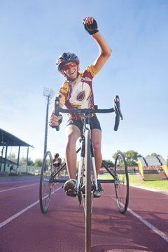 Cyclist at finishing line in para-athletic competition
