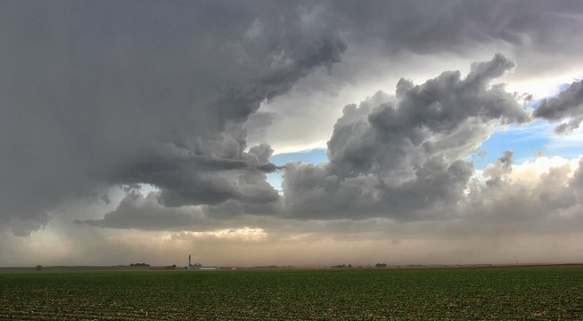 Outflow winds from this set of congealing cells cover rural town in dust, Lexington, Nebraska, USA