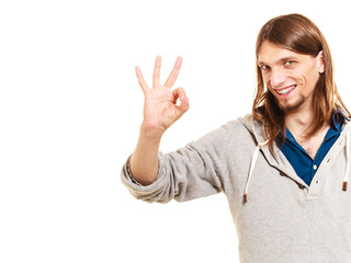 Man showing ok fine alright gesture.