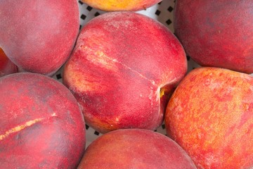Natural red nectarines. Closeup