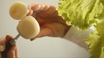 Eggslettuce and boiled egg on the glass surface - Powered by Adobe