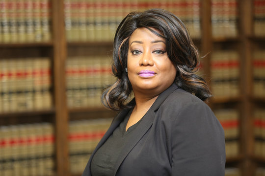  Attractive African American Woman Lawyer in Law Library