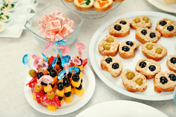 Set of cold snacks, canape and dessert, closeup