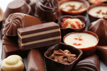 Assorted chocolate candies, close up