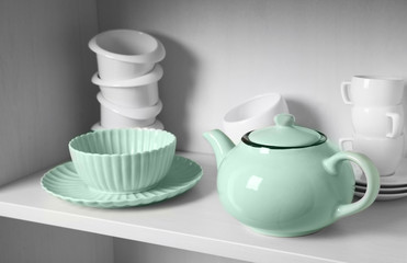 Dishes in cupboard in the kitchen