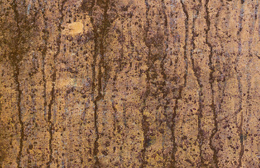 Golden like painted surface with brown dye vertical flows.