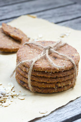 Fitness oat biscuits on an old wooden surface. Closeup