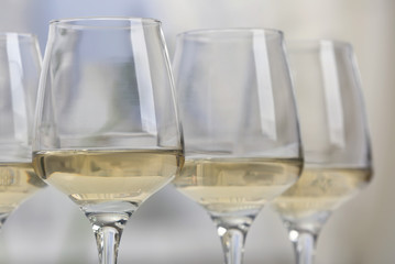 Glasses of white wine closeup