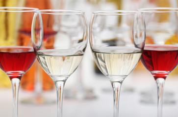 Wine glasses with red and white wine, closeup