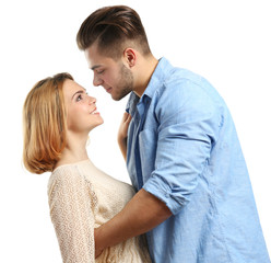 Young couple in love embracing, isolated on white