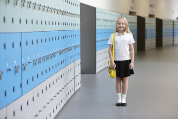 Portrait of schoolgirl in corridor