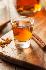 Cinnamon Whiskey Bourbon in a Shot Glass