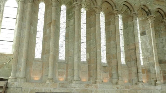 Mont Saint Michel stone corridors and windows Normandy France 4K 3840X2160 UHD video - Mt Saint Michel famous UNESCO heritage   arcs and columns 4K 2160p UHD footage