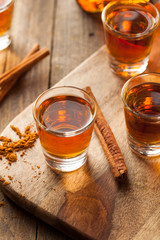 Cinnamon Whiskey Bourbon in a Shot Glass