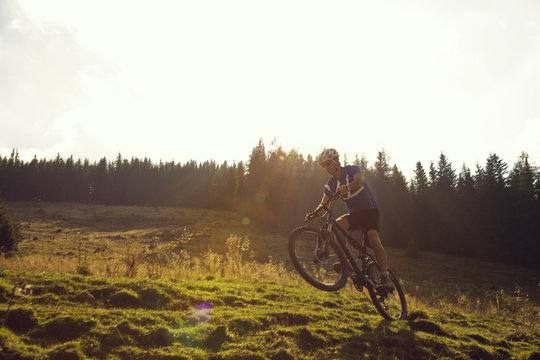 Mature man mountain biking, Styria, Austria