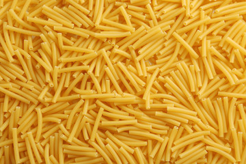 Italian dry pasta background, top view