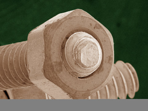 Coloured SEM of nut and bolt