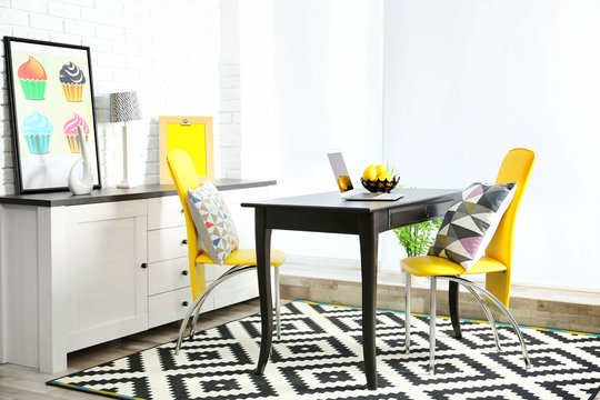 Modern room design. Furniture set with table and chairs