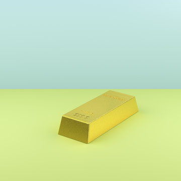Still life of gold bar on green and blue background