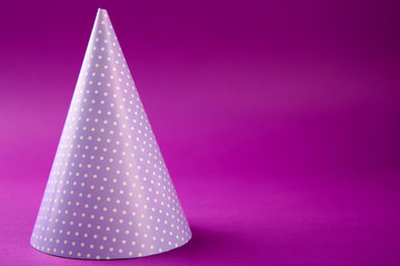 Dotted Birthday hat on purple background