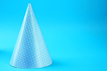 Dotted Birthday hat on blue background