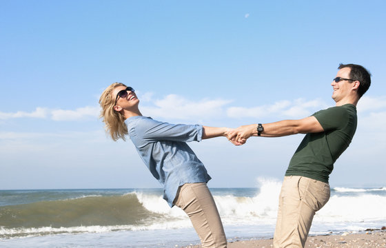 Couple enjoying vacation on beach