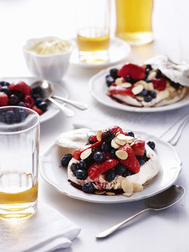 Still life of almond and beery pavlovas