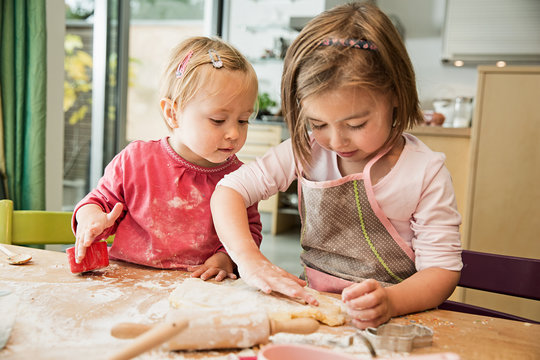Children baking in kitchen - Powered by Adobe