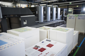 Pallets of finished printed products in paper printing warehouse