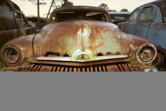 Close up of vintage car in scrap yard