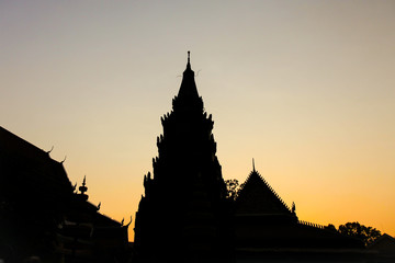 Silhouette of Buddhist Temple in Asia during sunset