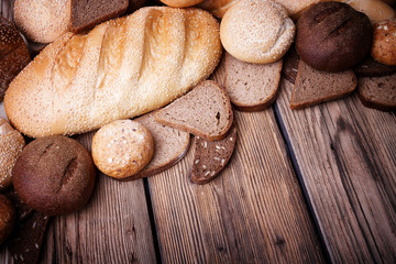 Assortment of bread on a wooden table