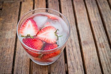 Close-up glass of strawberry infused water