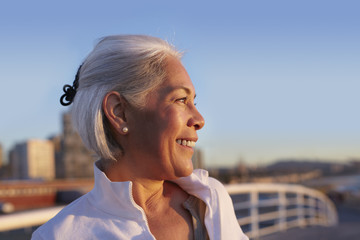 Close up profile of silver-haired mature woman